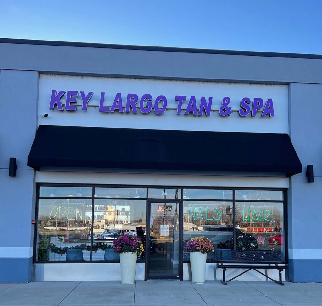 Exterior view of Key Largo Tan & Spa, showcasing the inviting storefront and signage in East Alton, IL.