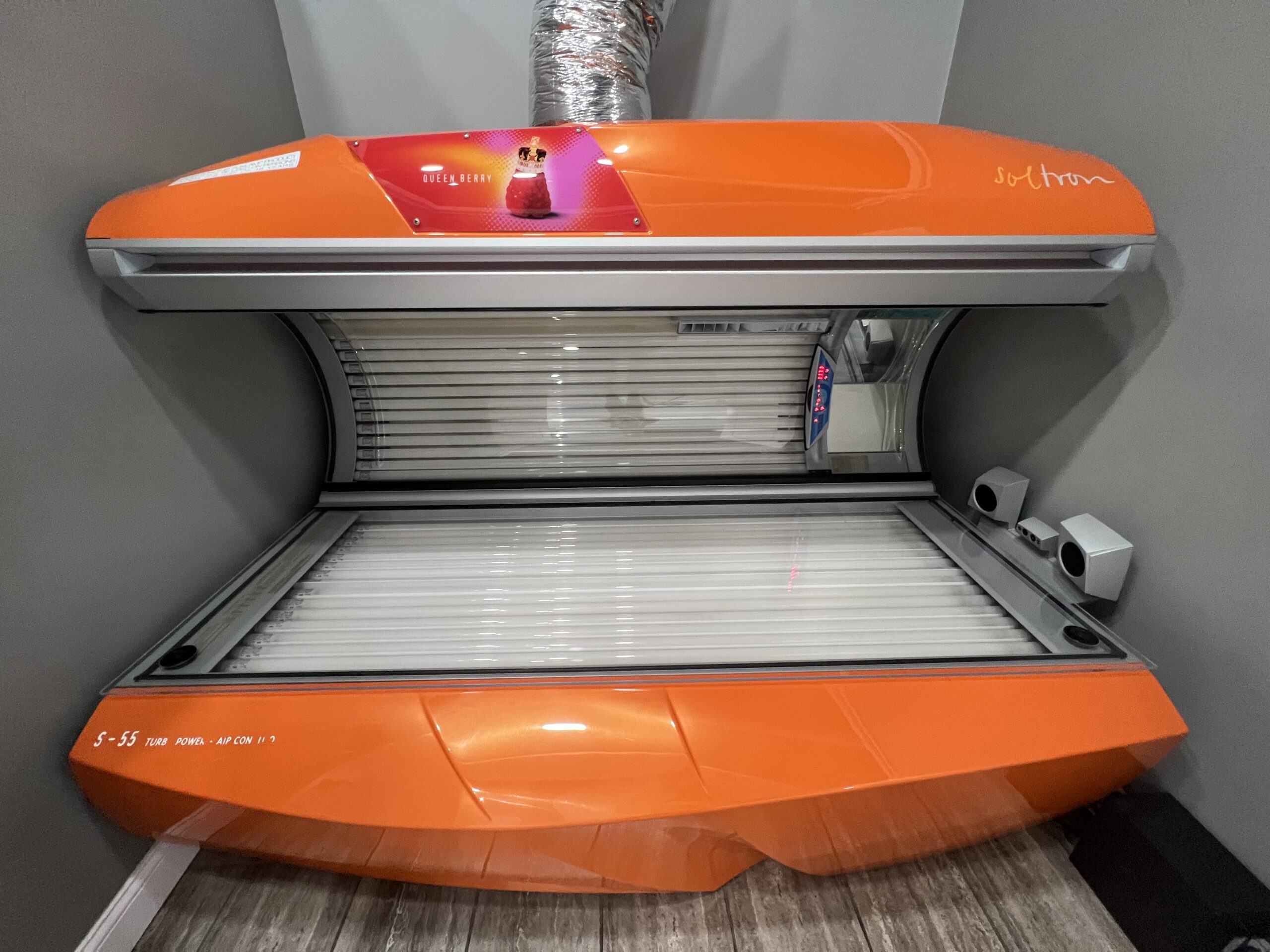 Stylish Soltron S-55 Queen Berry tanning bed at Key Largo Tan & Spa, East Alton, IL, combining aesthetics with effective tanning features.