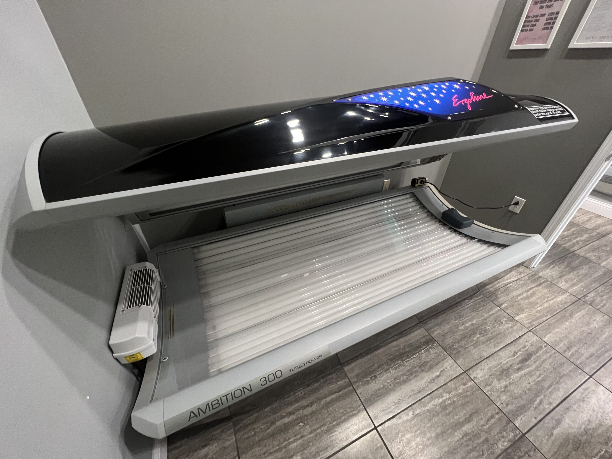 Advanced Ergoline Ambition 300 Turbo Power tanning bed at Key Largo Tan & Spa, East Alton, IL, combining technology and comfort for ideal tanning.